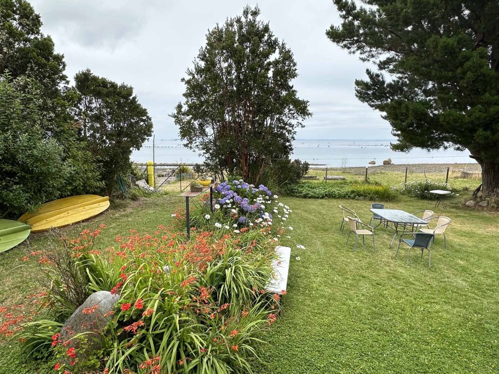 Unterkunft  Hostal y Cabanas Mozart Gartenansicht bei Puerto Montt - Patagonien  Reise